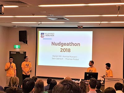University of Adelaide team making their presentation at Nudgeathon