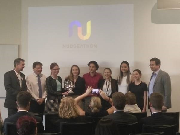 The team from the University of Sydney receiving their award for winning.